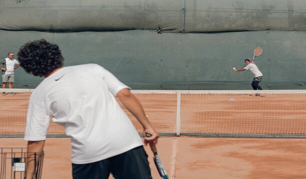 cours de tennis avec un prof